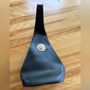 Black Leather Bag with Gold Medallion Designer Emblem